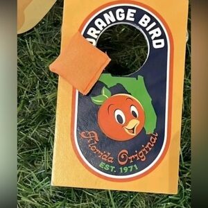 NWT. Disney Parks Epcot Flower Garden Prize Corn Hole game Orange Bird